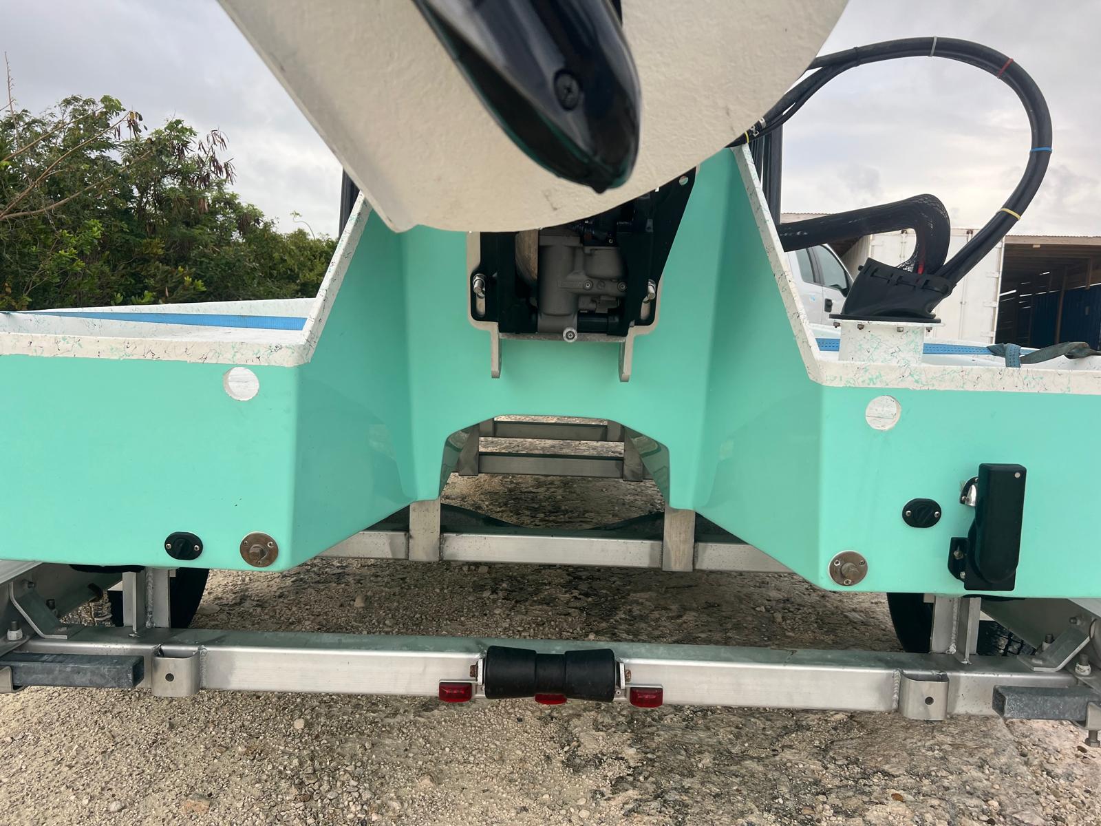 Chiquita boat showing the tunnel hull, which gives it its unique shallow water capability